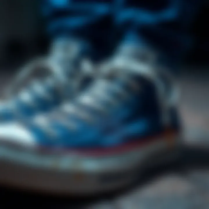 Durable Blue Converse Shoes A pair of well-worn blue Converse shoes showing signs of durability