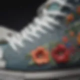 Close-up view of the floral embroidery on Converse Chuck Taylor All Star sneakers