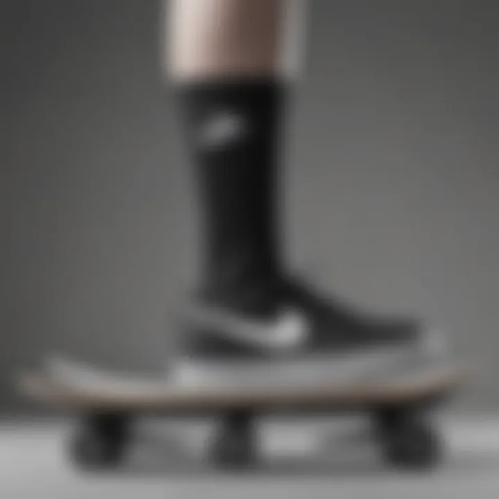 Stylish black and white Nike socks displayed on a skateboard