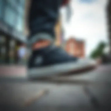 Stylish all black Converse sneakers on a city street