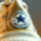 A close-up of the iconic Converse All Star logo on the shoe's tongue
