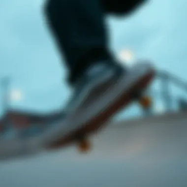 Skateboarder performing a trick while wearing Vans Pro Black and White