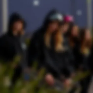 Authentic Style Tips from Skateboarding Community Group of female skateboarders in black hoodies sharing tips on style