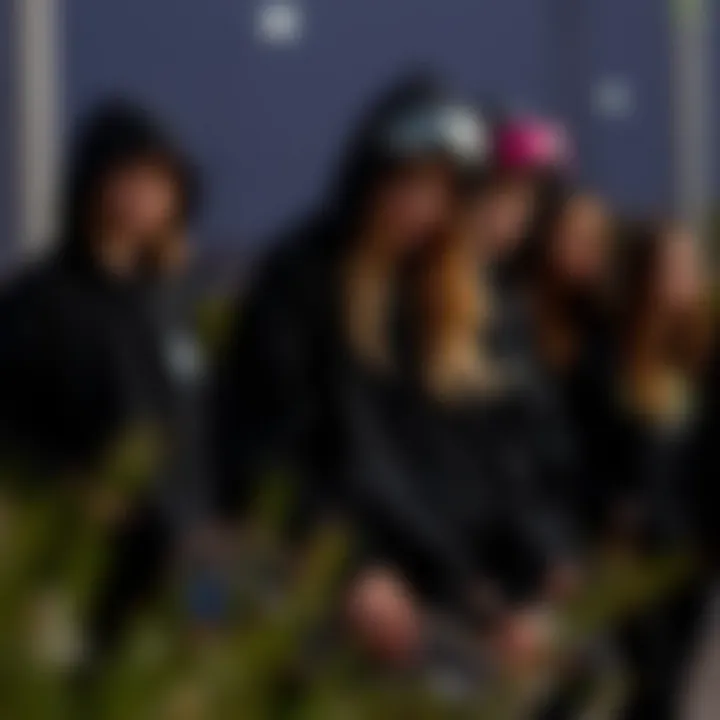 Authentic Style Tips from Skateboarding Community Group of female skateboarders in black hoodies sharing tips on style