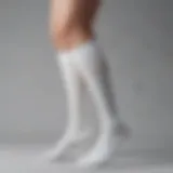 Nike long white socks showcasing design and texture