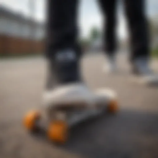 Classic black Chuck Taylors on a skateboard