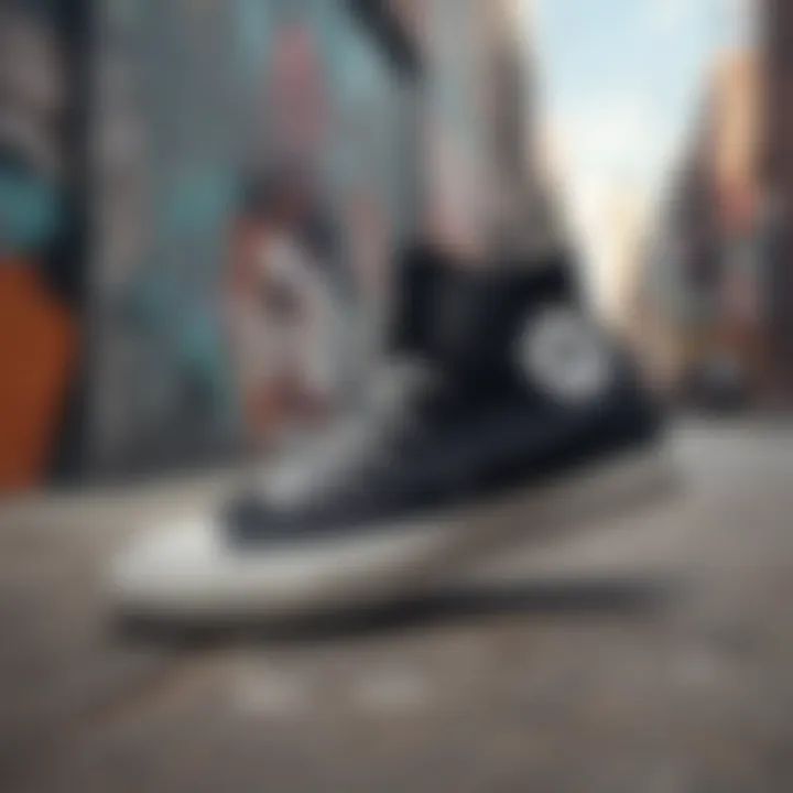 Artistic display of black Chucks against a graffiti backdrop