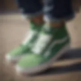 Vans Classic Green sneakers on a skateboard