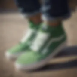 Vans Classic Green sneakers on a skateboard