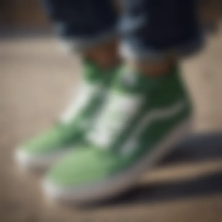 Vans Classic Green sneakers on a skateboard