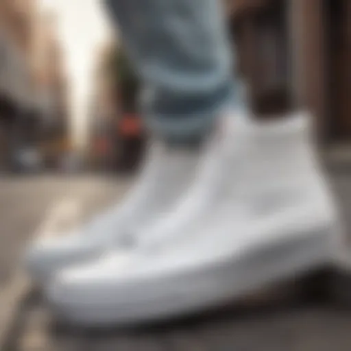 Classic white high top Vans on urban street