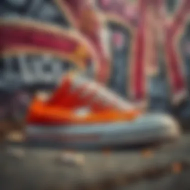 Close-up of burnt orange Converse low tops against a graffiti backdrop