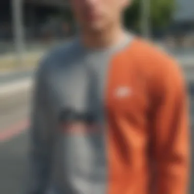 Close-up of Nike sweater detailing against a vibrant skate park backdrop