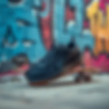 Stylish black sneakers resting on a skateboard against a graffiti wall