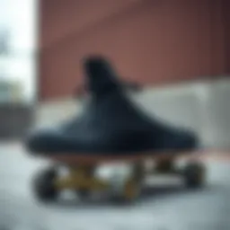 Converse Hi Black sneaker on a skateboard deck