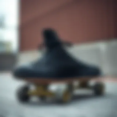 Converse Hi Black sneaker on a skateboard deck
