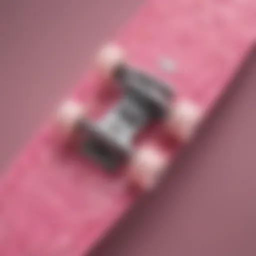 Vibrant pink skate deck showcasing intricate designs