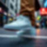 Stylish white Vans sneakers on a city street