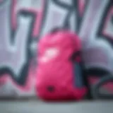 Stylish Pink Nike Backpack against a graffiti wall