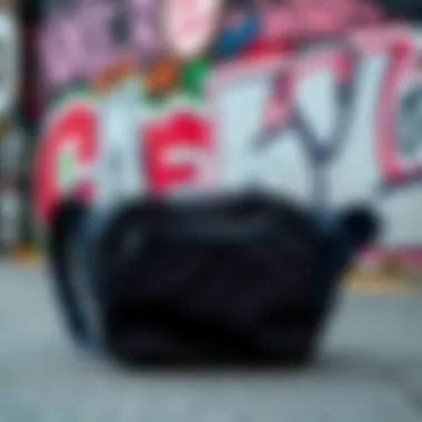 Urban Versatility Versatile black fanny pack displayed in an urban setting against graffiti