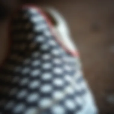 Close-up of the polka dot Vans slip-on showcasing its unique pattern and texture