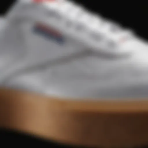 Close-up view of the Reebok Club C gum sole highlighting its texture and craftsmanship.