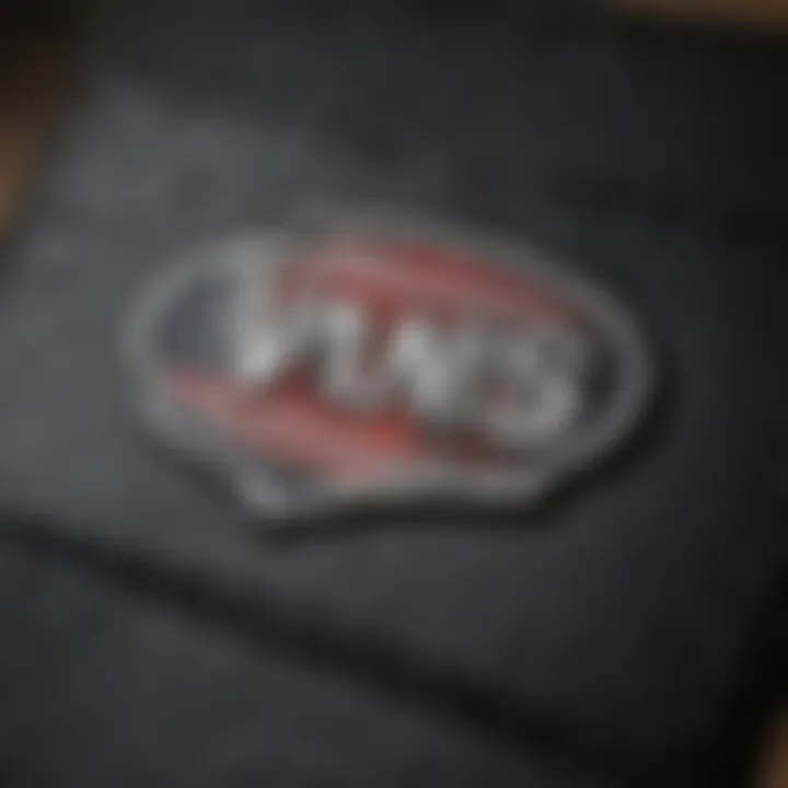 Close-up of the Vans logo on the black wallet