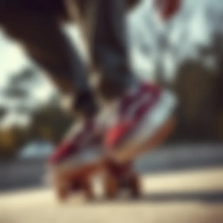 Skater performing a trick wearing maroon suede Vans on a skateboard