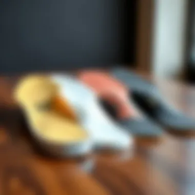 A side-by-side comparison of Vans insoles and other popular brands on a wooden surface.