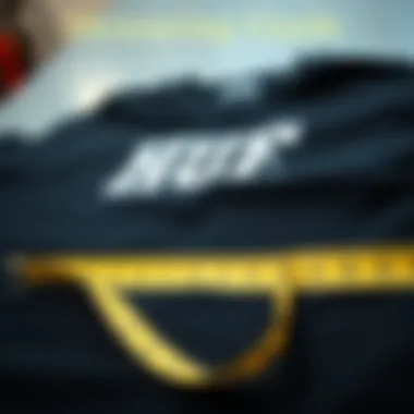 A measuring tape placed next to a HUF T-shirt