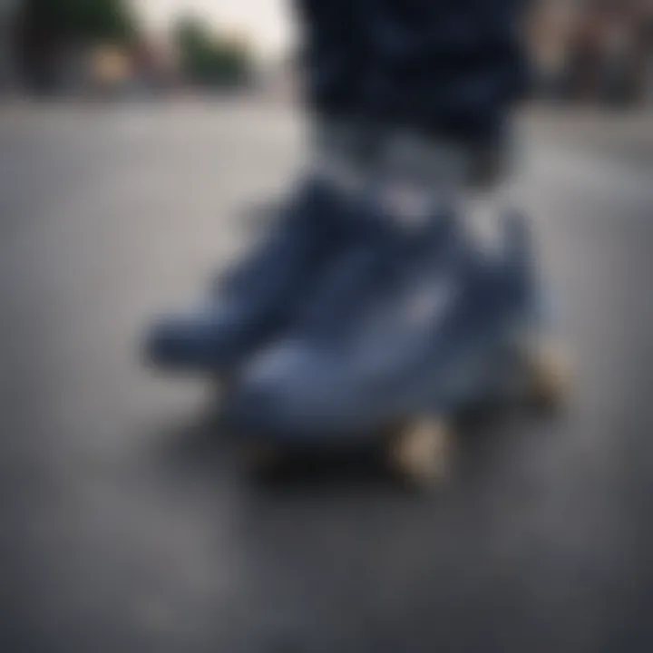 Stylish navy blue Fila shoes on a skateboard