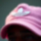 Detailing the Iconic Pink Adidas Hat Close-up of a pink Adidas hat showcasing its unique design