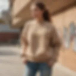 Stylish Tan Nike sweatshirt in an urban skate park setting