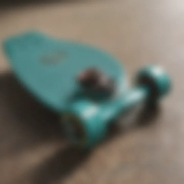 Close-up view of the teal penny board showcasing its unique design and craftsmanship.