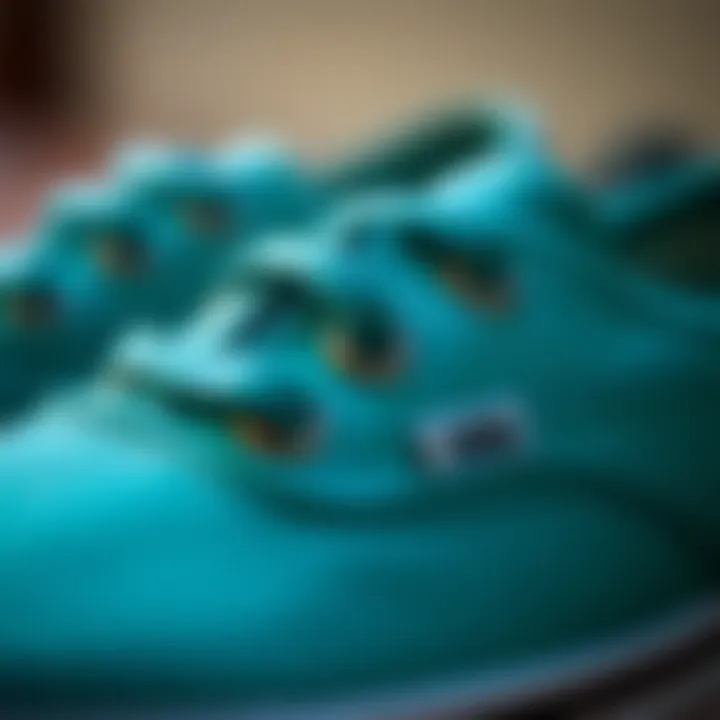 Close-up of teal Vans showcasing texture