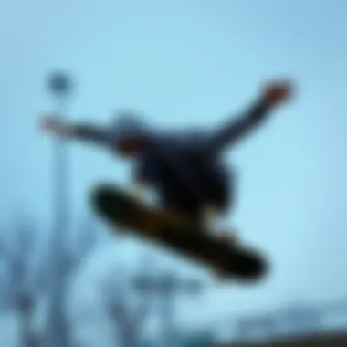 A skateboarder wearing a black and white graphic hoodie performing a trick