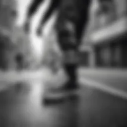 Skateboard on an urban street with black and white Adidas socks