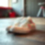 Stylish White Converse with Floral Patterns A pair of white Converse sneakers with intricate floral patterns displayed stylishly