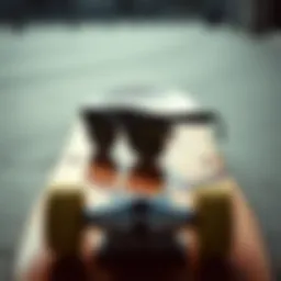 Close-up of micro sunglasses on a skateboard deck