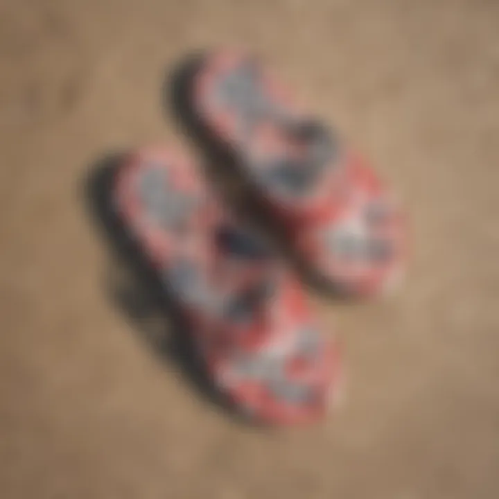 A pair of Vans checkerboard flip flops on a beach