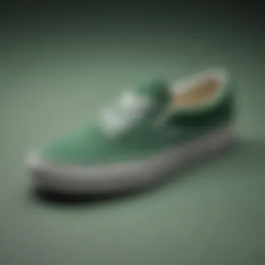 Close-up of the Vans logo on the Green Suede Slip-On