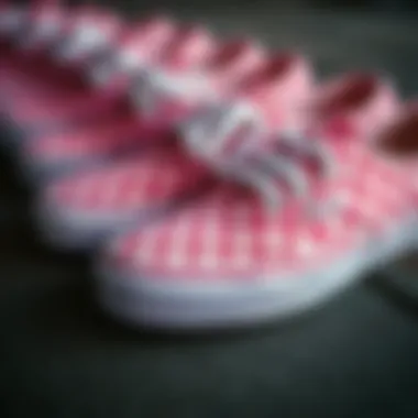 Close-up of Vans pink checkered slip-ons showcasing their design